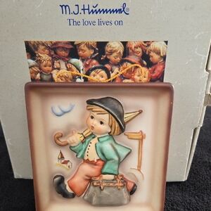 Hummel Figurine with Green and Brown Accents. "Merry Wanderer Plaque"